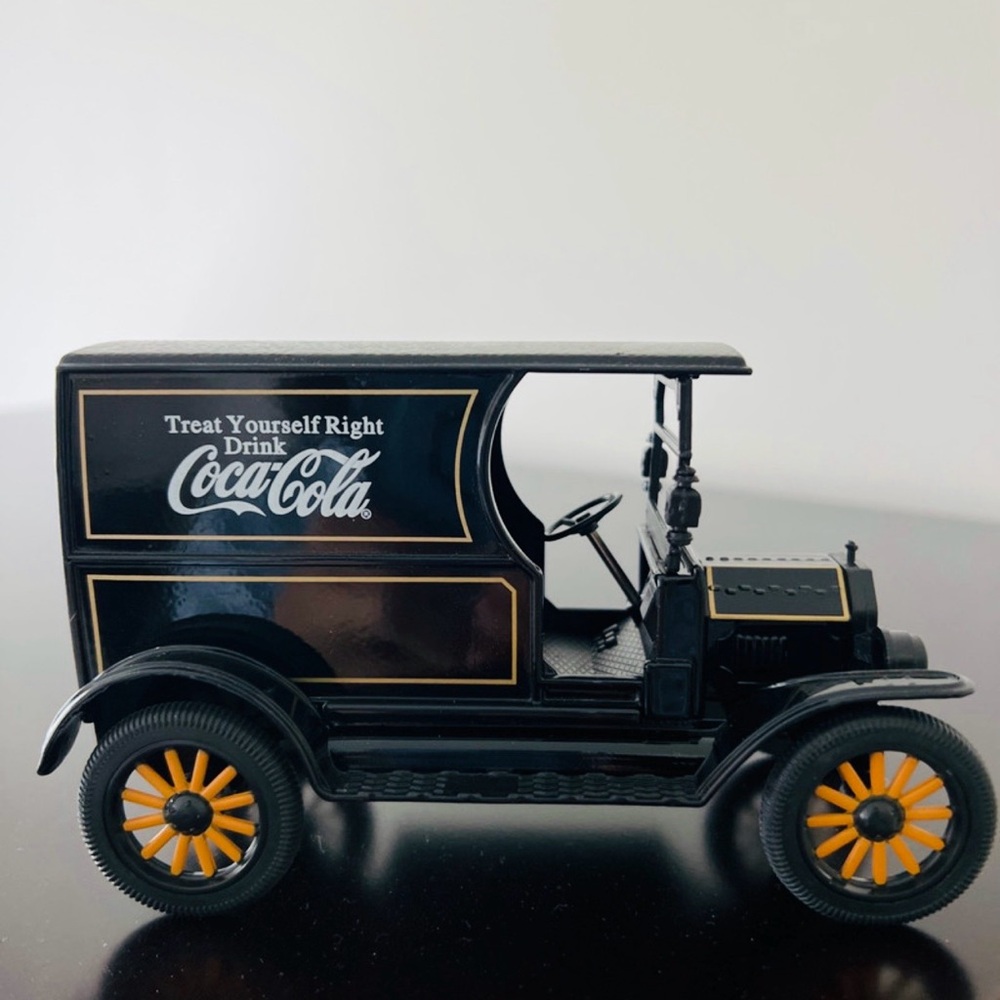 Coca-Cola Black Model Truck with Orange Wheels